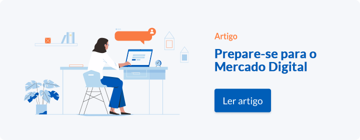 Pessoa sentada em sua escrivaninha com seu laptop se preparando para o mercado digital.